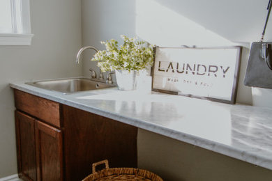 Inspiration for a contemporary laundry room remodel in Other