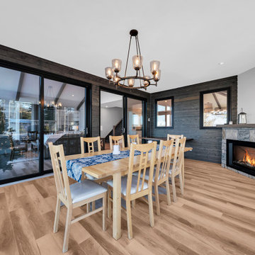 Contemporary Dining Room with Corner Fireplace