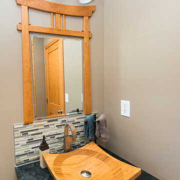 Asian archway mirror frame & stone backsplash