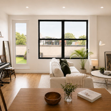 Sunlit Living Room with Piano and Roof Deck Access
