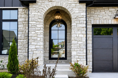 Example of a transitional exterior home design in Chicago
