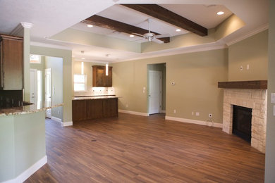 Example of a transitional home design design in Houston