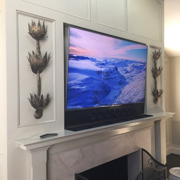 Recessed TV & Custom Soundbar over fireplace