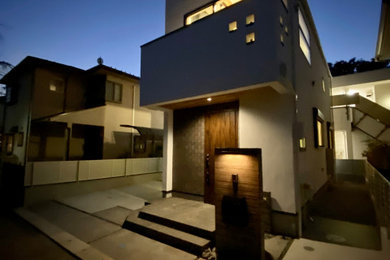 東京都下にあるラスティックスタイルのおしゃれな家の外観の写真