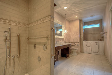Inspiration for a large contemporary master porcelain tile bathroom remodel in Seattle with medium tone wood cabinets, a two-piece toilet, an undermount sink and quartz countertops