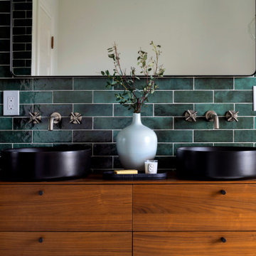 Dark Green Subway Tile and Brass Bath Faucets