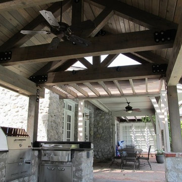 Stone Outdoor Kitchen Addition with Fireplace and Hasty-Bake Charcoal Grill
