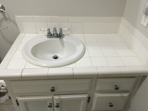 how to regrout bathroom sink