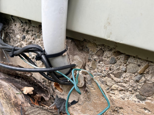 Best way to waterproof hole for electrical wires in exterior concrete