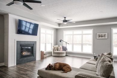 Example of a farmhouse living room design in Columbus