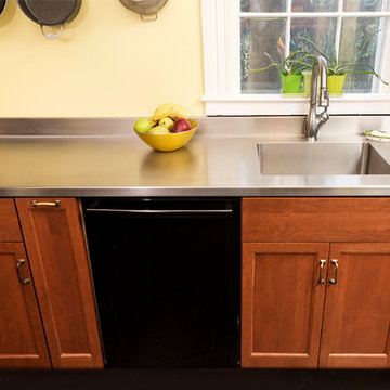Cherry Kitchen with Steel and Butcher Block Countertops