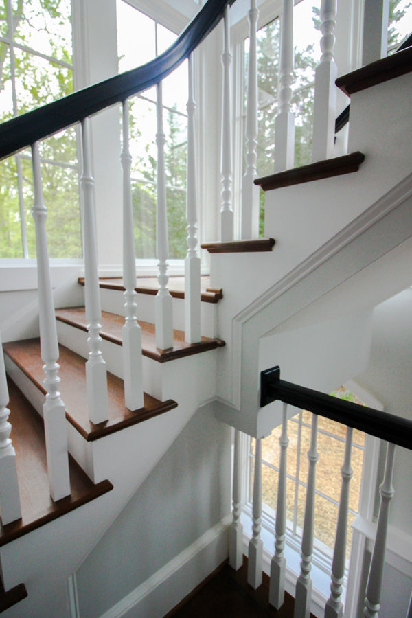 Powerful Impression by Floating Staircase in Suburban Foyer