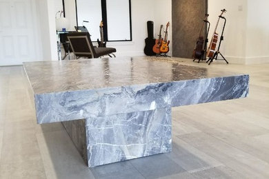 Large trendy porcelain tile and gray floor hallway photo in Miami with white walls