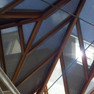Main Line Conservatory (Fixed Solar Screens & Lutron Motorized Roller Shades)