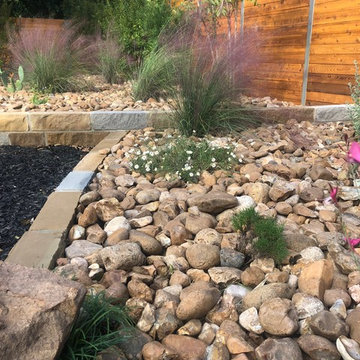 Combination of Mulch, Sandstone beds w/ Colorado River Rock