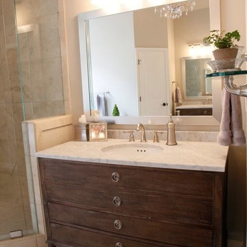 Contemporary Bathroom Mixes Marble and Wood