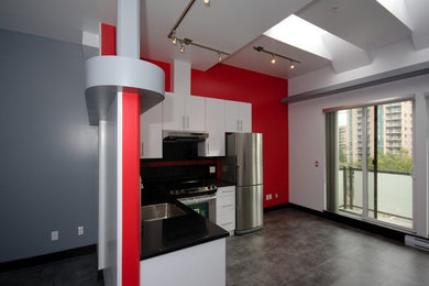 Kitchen - modern kitchen idea in Vancouver