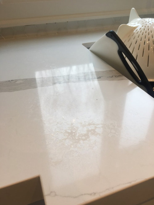 Weird Blemishes And Cloudy Areas On Quartz Countertop