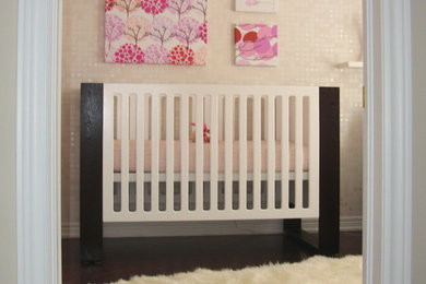 Minimalist nursery photo in Toronto