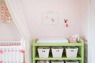 Nursery - shabby-chic style girl nursery idea in Toronto with pink walls