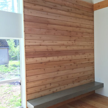 Concrete bench and cedar accent wall