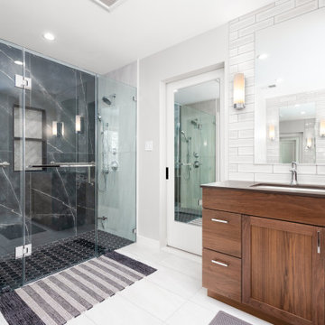 Modern Luxe Retreat: Walnut Vanity and Black Tile Bathroom Renovation