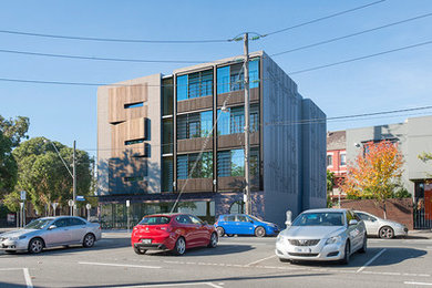 This is an example of a mid-sized industrial home design in Melbourne.