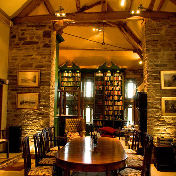 Gilded and painted library over several rooms in a converted 11th century barn