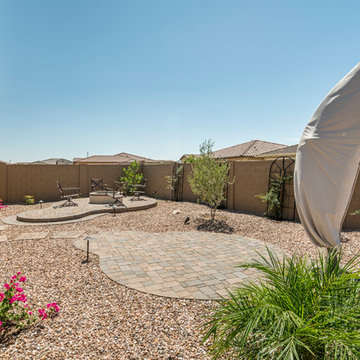 Desert Landscape with Raised Paver Patio and Vanishing Pottery Fountain