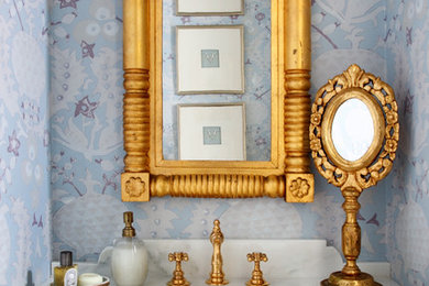 Inspiration for a contemporary powder room remodel in DC Metro with an undermount sink, raised-panel cabinets, white cabinets and white countertops