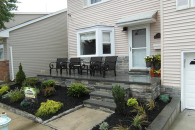 Example of a beach style patio design in New York