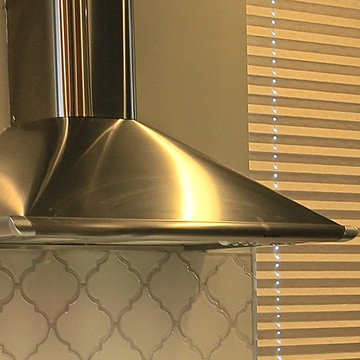 Urban Kitchen Remodel | Curved Peninsula Design & Mid-Century Modern Accents