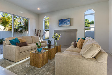 Example of a transitional living room design in Miami