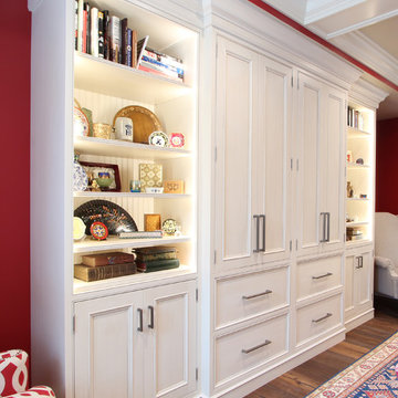 Inset Cabinets Painted White with a Glaze used for Built Ins in Red Family Room