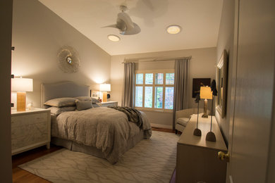 Inspiration for a mid-sized contemporary master light wood floor bedroom remodel in Toronto with gray walls