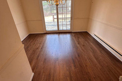 Mid-sized trendy guest dark wood floor bedroom photo in Orlando