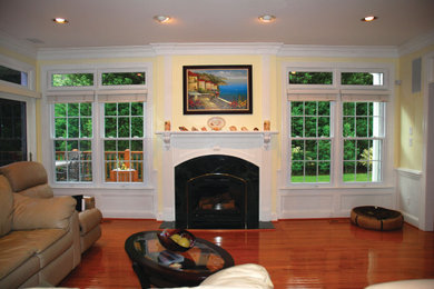 Arts and crafts living room photo in Omaha