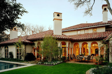 Inspiration for a mediterranean exterior home remodel in Dallas