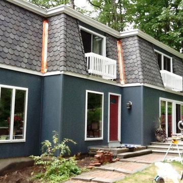 Mansard roof with copper trim and new siding