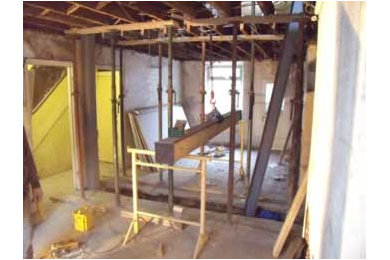 Removal of a main load bearing wall in a family dwelling