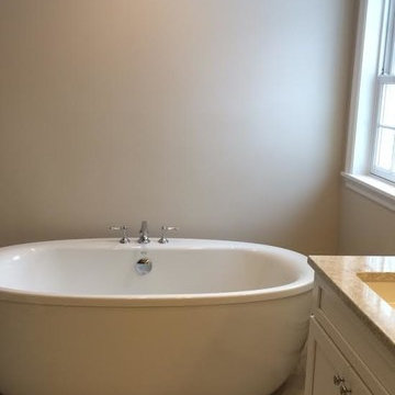 Contemporary Latte Bathroom Remodel with Darlington Quartz Counter top