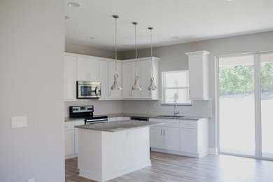Kitchen - coastal kitchen idea in Orlando