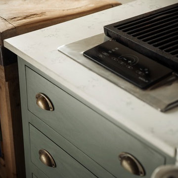 Rustic green kitchen with open plan shelving