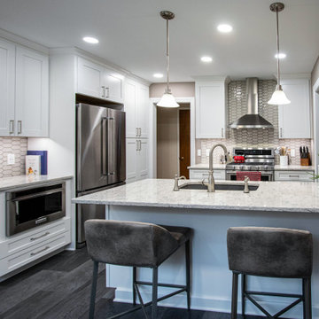Grey and White Shaker Kitchen with Quartz Countertops and Picket-Style Tile