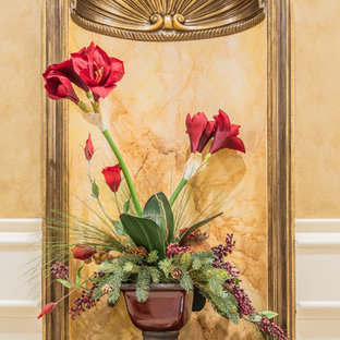 Photo of a large and mixed classic curved staircase in Other with limestone treads and limestone risers.