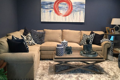 Mid-sized trendy enclosed light wood floor family room photo in Baltimore with blue walls