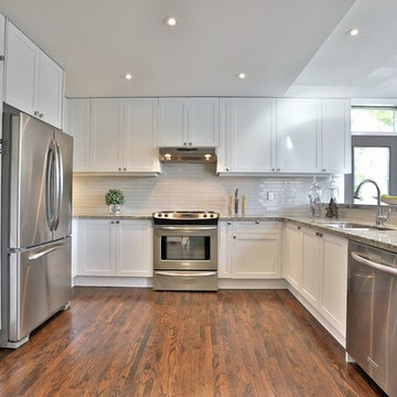 Shaker style kitchen and granite countertop in Toronto