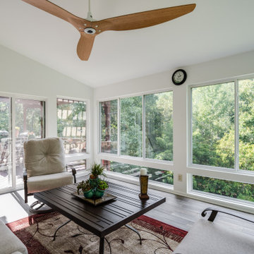 Sunroom with Soaring Ceiling and Panoramic Windows