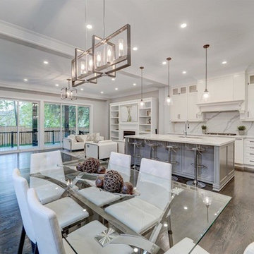 Custom kitchen / dining area with a view of the stunning backyard