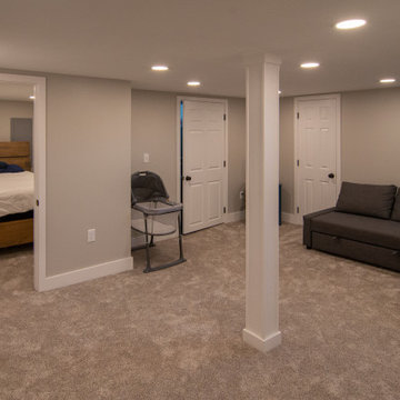Bathroom/Laundry Room Using Warmer Tones, Accented by New Laundry Facility
